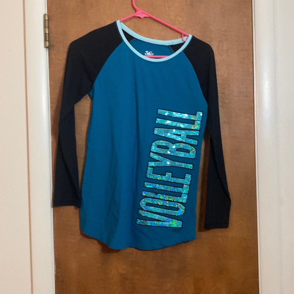 this a a long sleeve justice shirt for a volleyball player !!